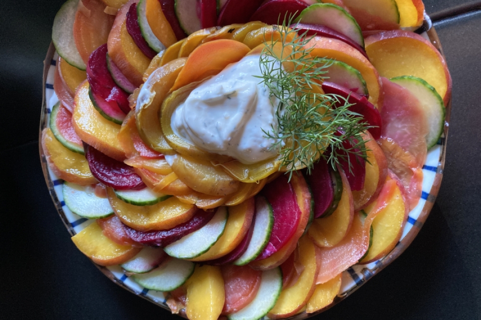 A platter of sliced peaches swirled