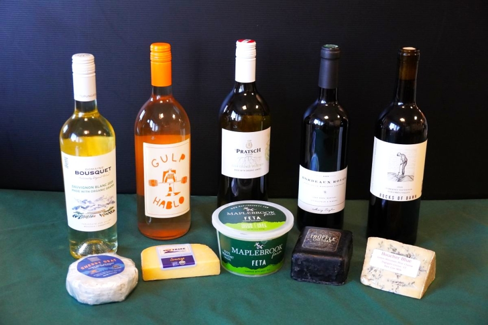 bottles of wine and cheese