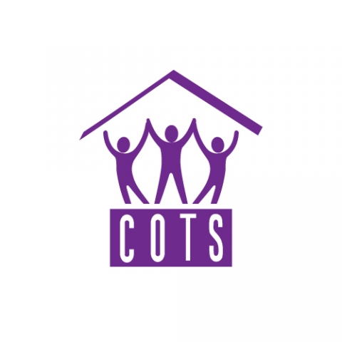 Logo for COTS featuring a purple drawing of 3 people figures joined at the hands with a roof shape above them. The three people figures are standing on top of a rectangle with COTS written in white.