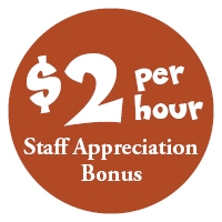 Rust red circle with the text "$2 per hour Staff Appreciation Bonus" inside in white text.