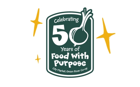 A green rectangle with rounded top and bottom. Inside the rectangle are the words "Celebrating 50 Years of Food with Purpose." The "0" in the 50 is an onion.