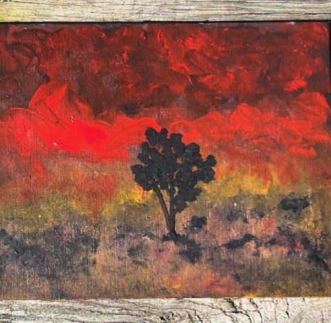 A painting of a dark tree with an abstract background. The tree is in the center of the image, and several shades encompass the top half of the painting background. The bottom half is a mix of yellow, blue, green, and orange. There are wooden borders.