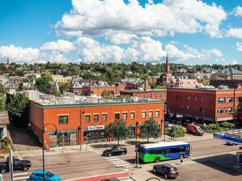 Summer aerial view of City Market's downtown store on a sunny day