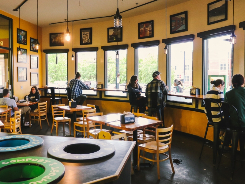 people sitting inside a cafe
