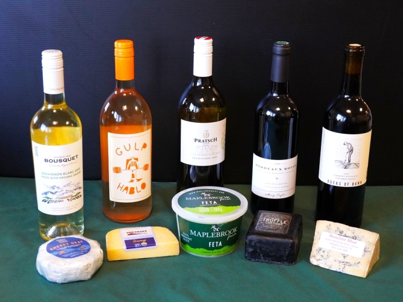 bottles of wine and cheese